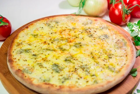 Imagem ilustrativa de pizza 4 Queijos